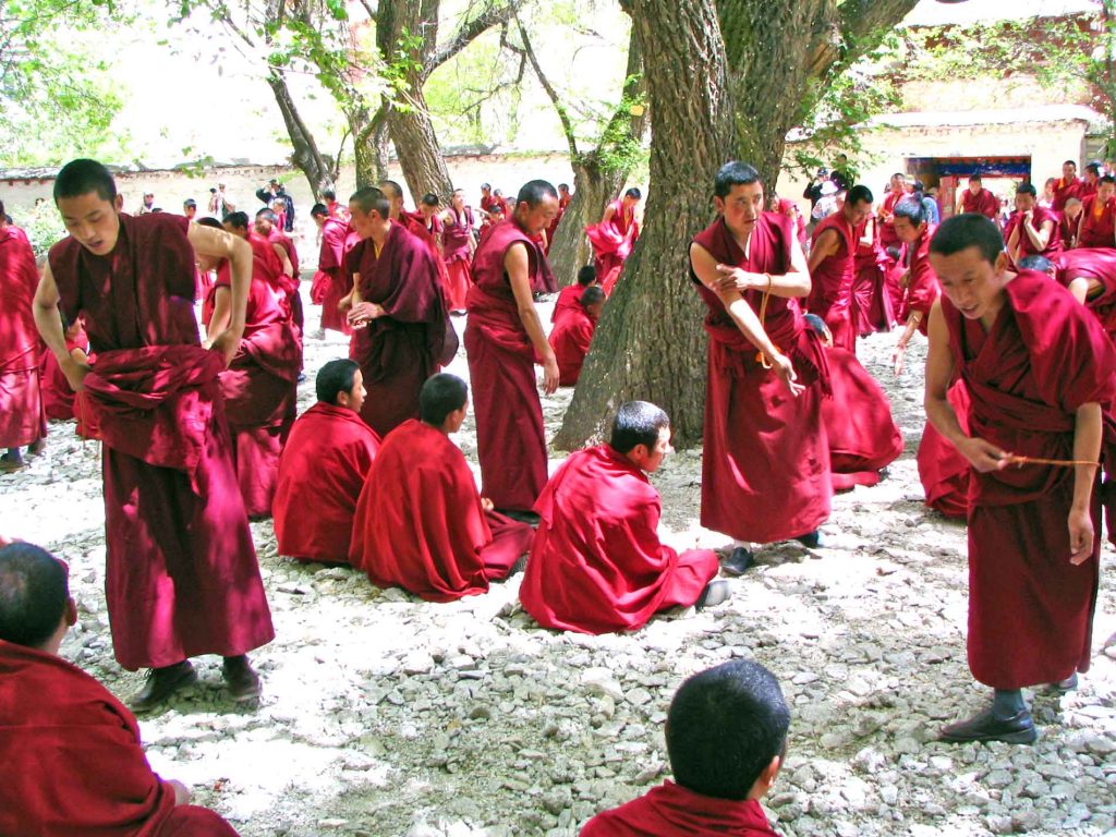 Monks Teaching The Scriptures At The Sera Monastry In Lhasa