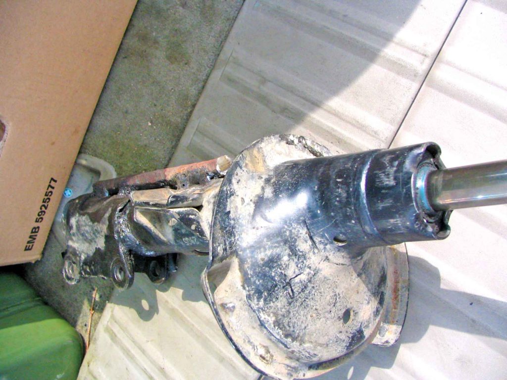 The Damaged Shock Absorber With The Steel Bar Welded To Allow Onward travel
